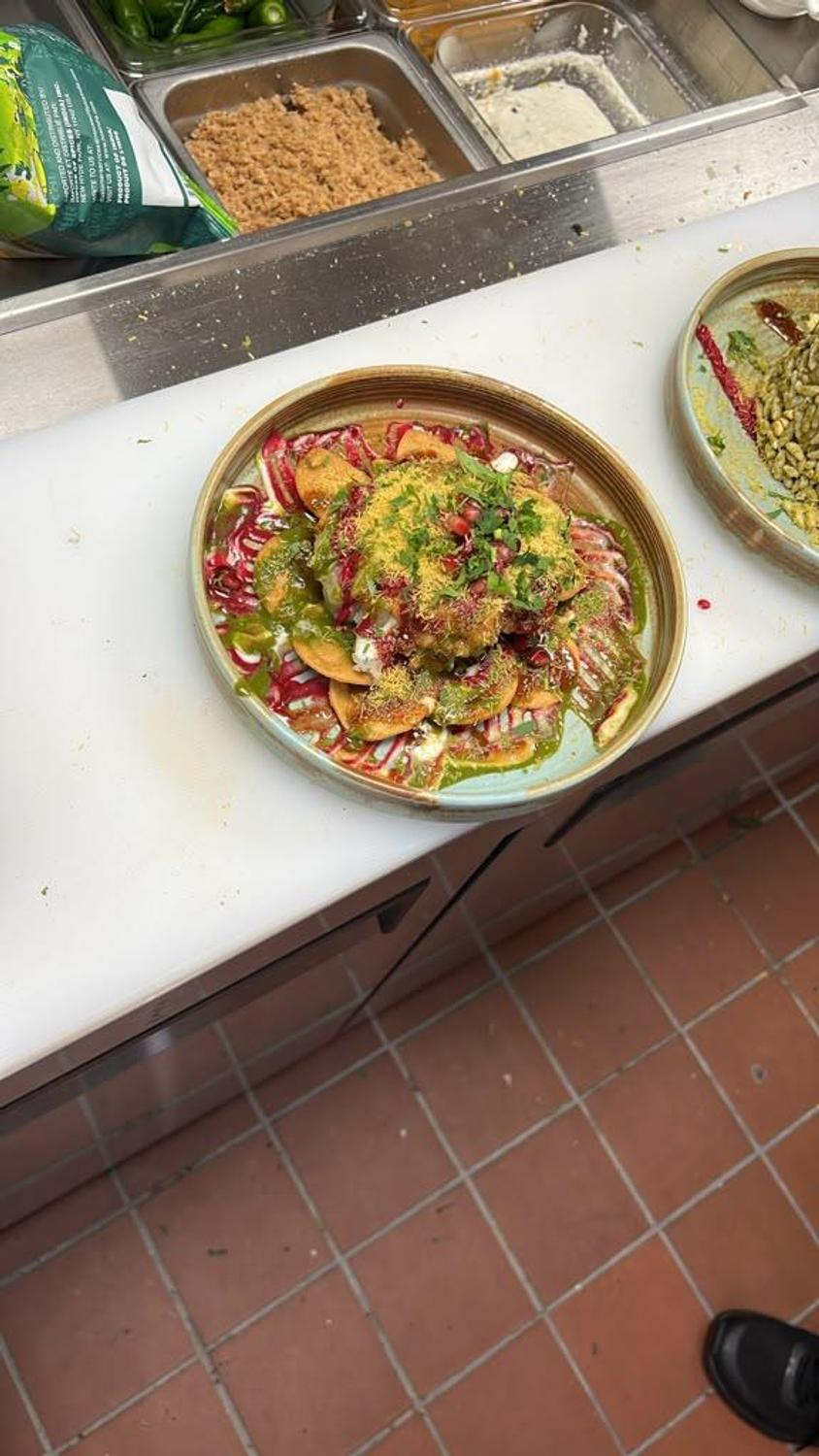Papdi chaat with green chutney and pomegranate
